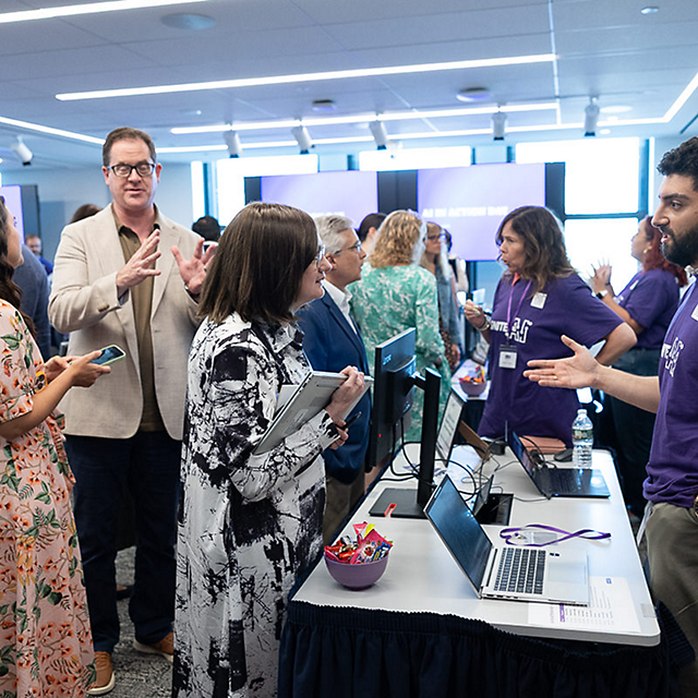 Employees at AI in Action event
