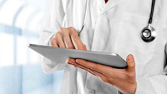 A doctor with his tablet