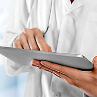 Doctor using an Ipad