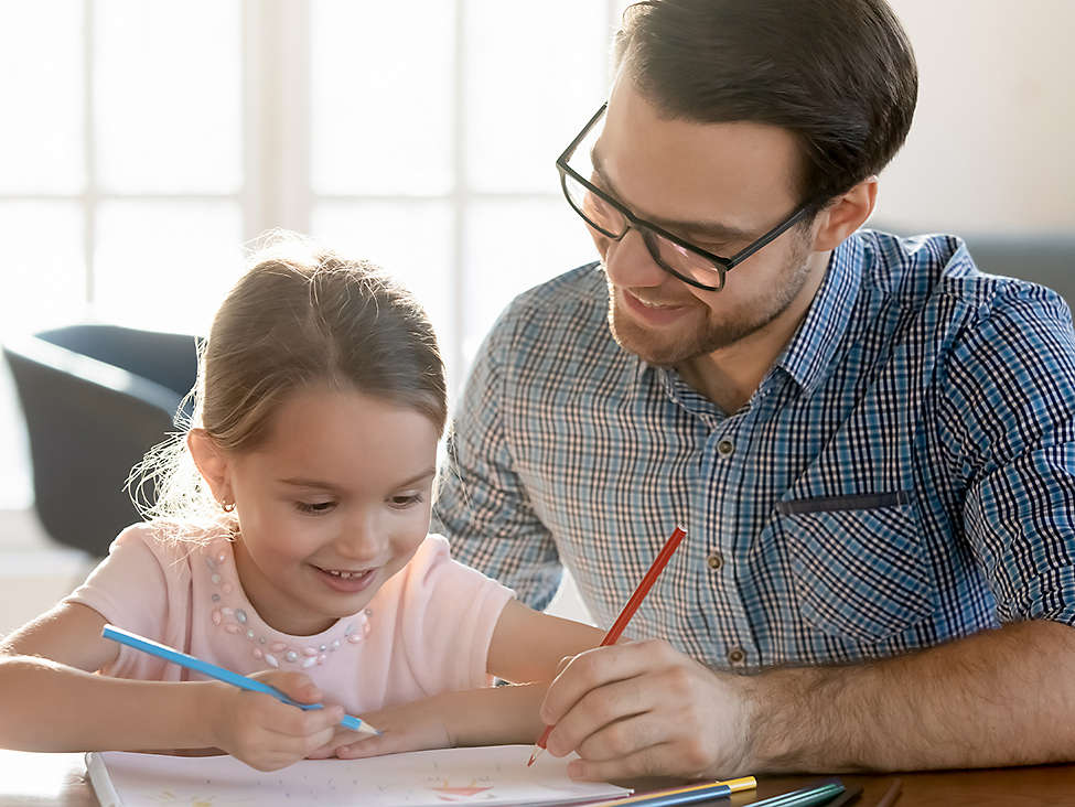 Father and daughter drawing