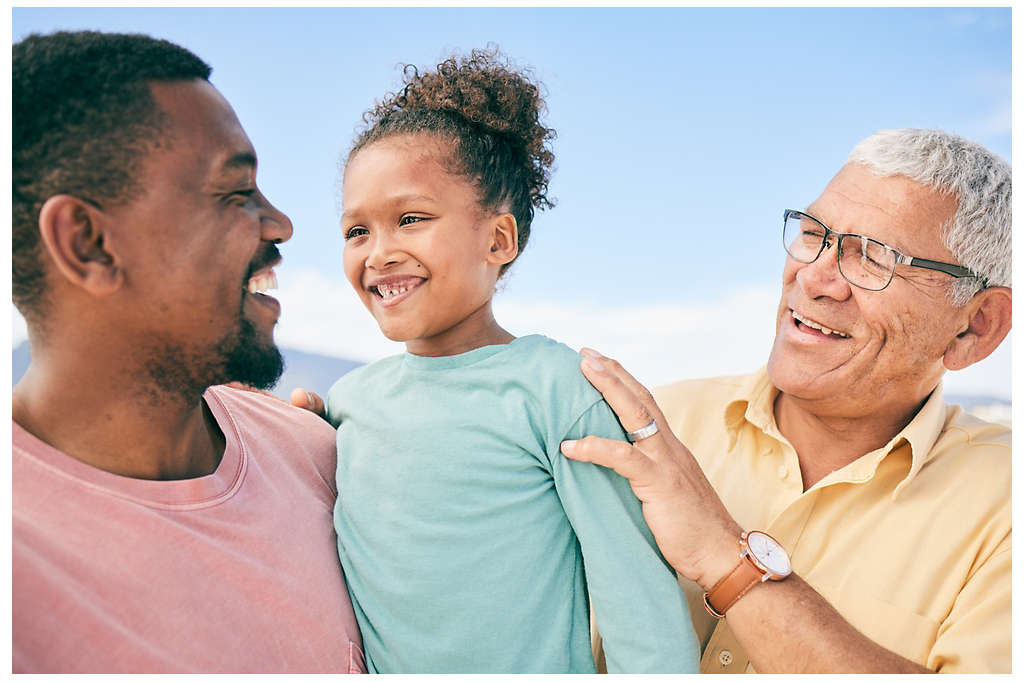 African-American father with young daughter and grandfather