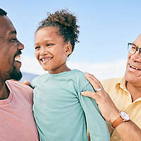 African-American man with young daughter and grandfather