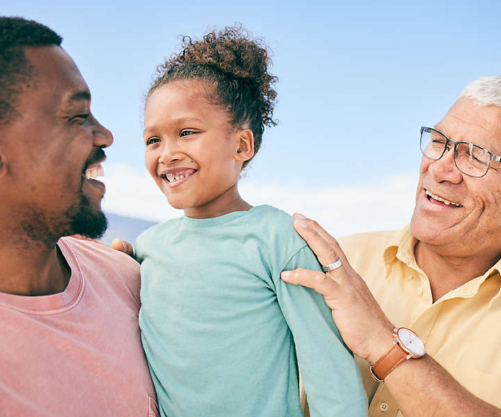 African-American man with young daughter and grandfather