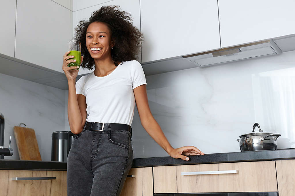 women drinking  smoothie