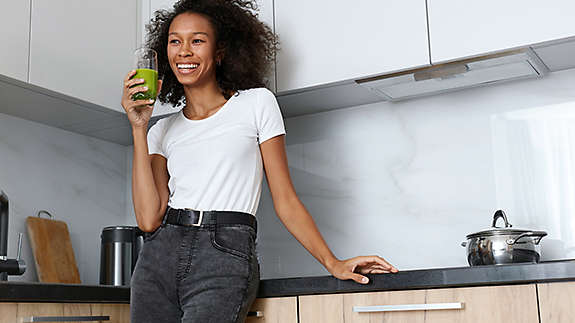 women drinking  smoothie