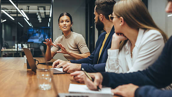 A group of colleauges collaborating at a table