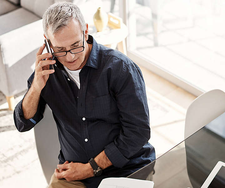 Older man on the phone