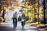 Senior couple riding bikes.