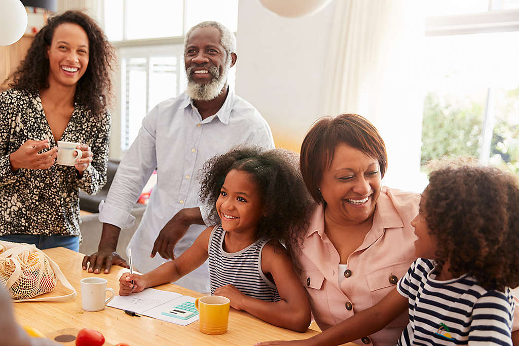 Family having breakfast in kitchen