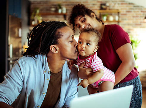 Parents showing affection to child