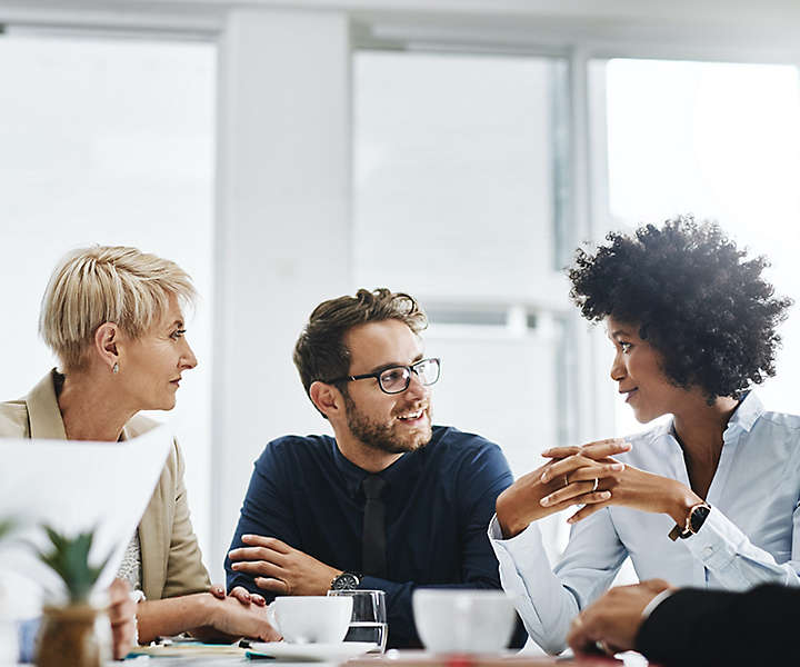 Group of coworkers talking