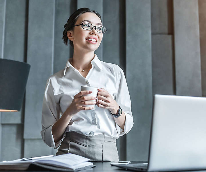 Women looking out office window