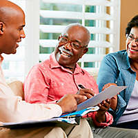 Retirees calculating RMDs with their financial professional