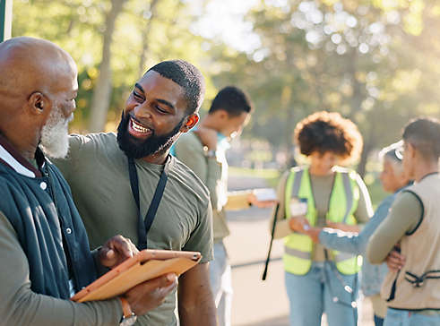 People volunteering outside