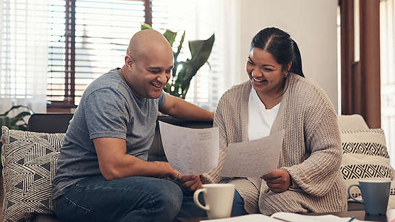 A woman and a man reviewing their finances