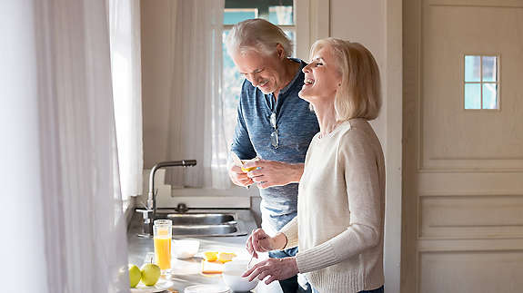 Man and women cooking