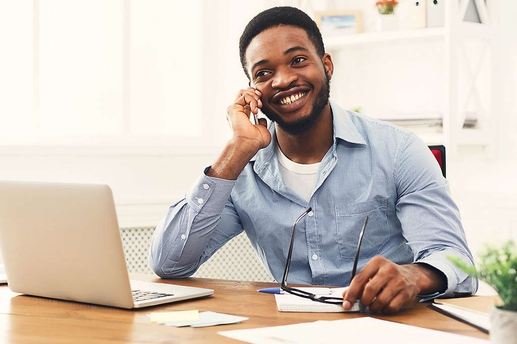 Man on laptop at home