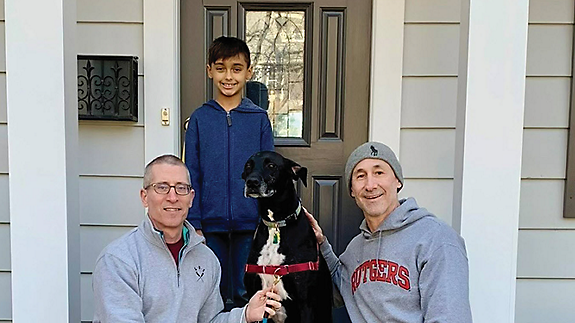 Corporate Vice President, Corporate Responsibility, Michael Burke (left) and his family.