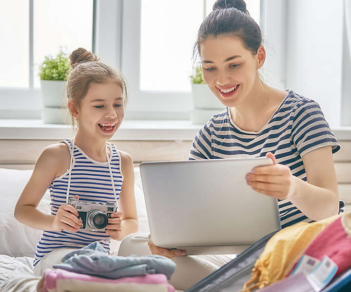 mom-and-daughter-with-camera-1x1