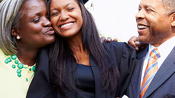 Parents celebrate daughter’s college graduation day