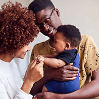 Young parents with their baby.