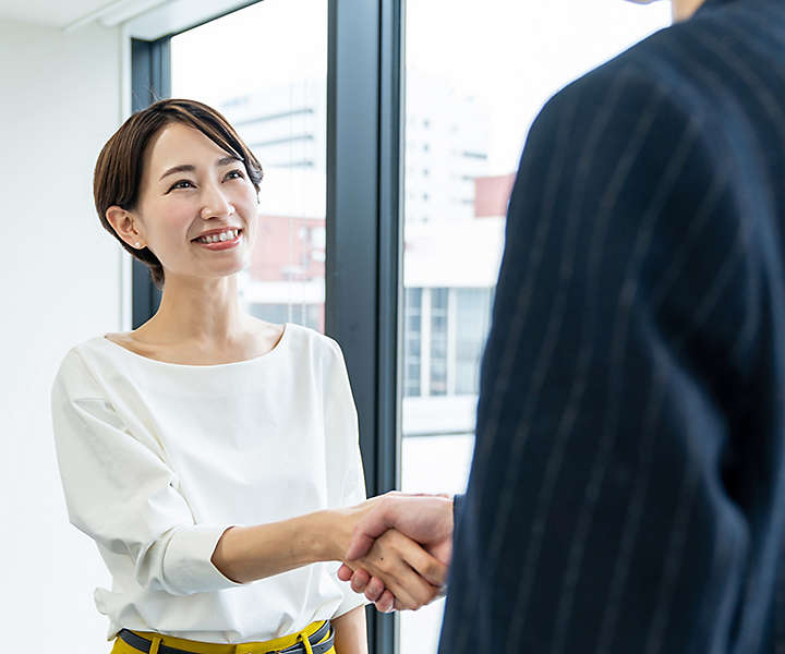 Colleagues shaking hands