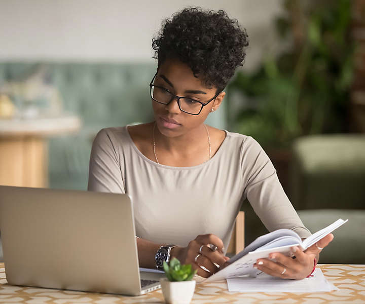 Women doing research on her computer