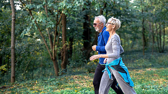 Elderly couple jogging