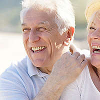 Elderly couple smiling together