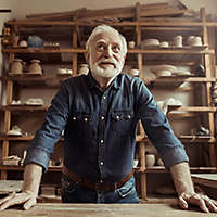 Older man in a pottery studio