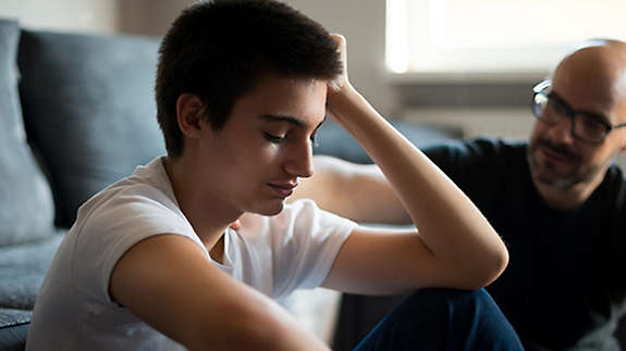 A kid looking upset