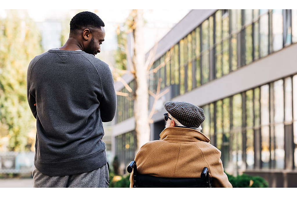 two-men-talking-outside