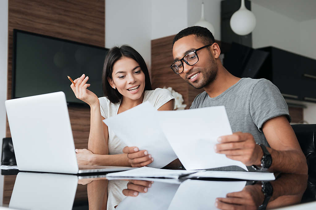 Couple looking at documents together