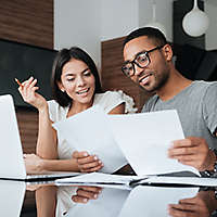 Couple looking at documents together