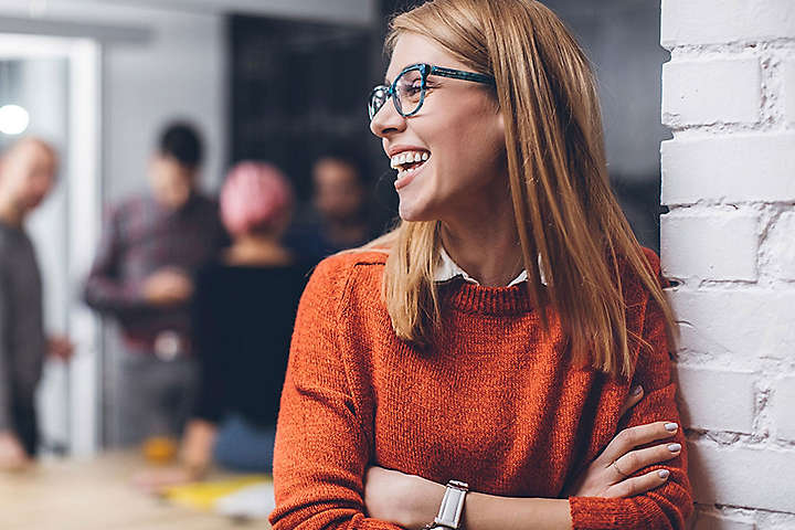 Women smiling in office