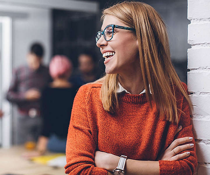 Women smiling in office