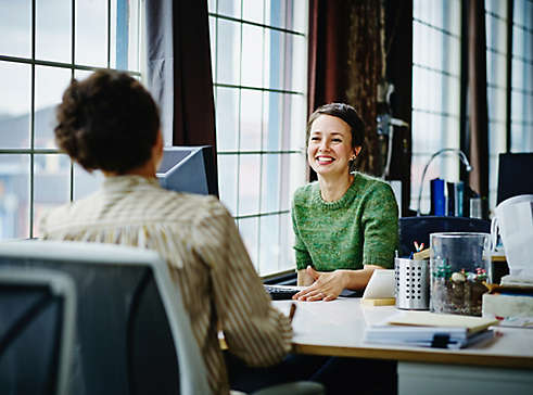 Women meeting with agent