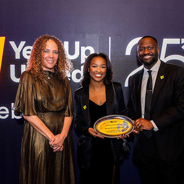 Ellen McClain, CEO of Year Up, with New York Life’s Tamara Taylor and Keith Byam.