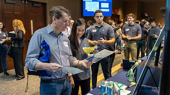 Employees at Data+Analytics+AI Expo