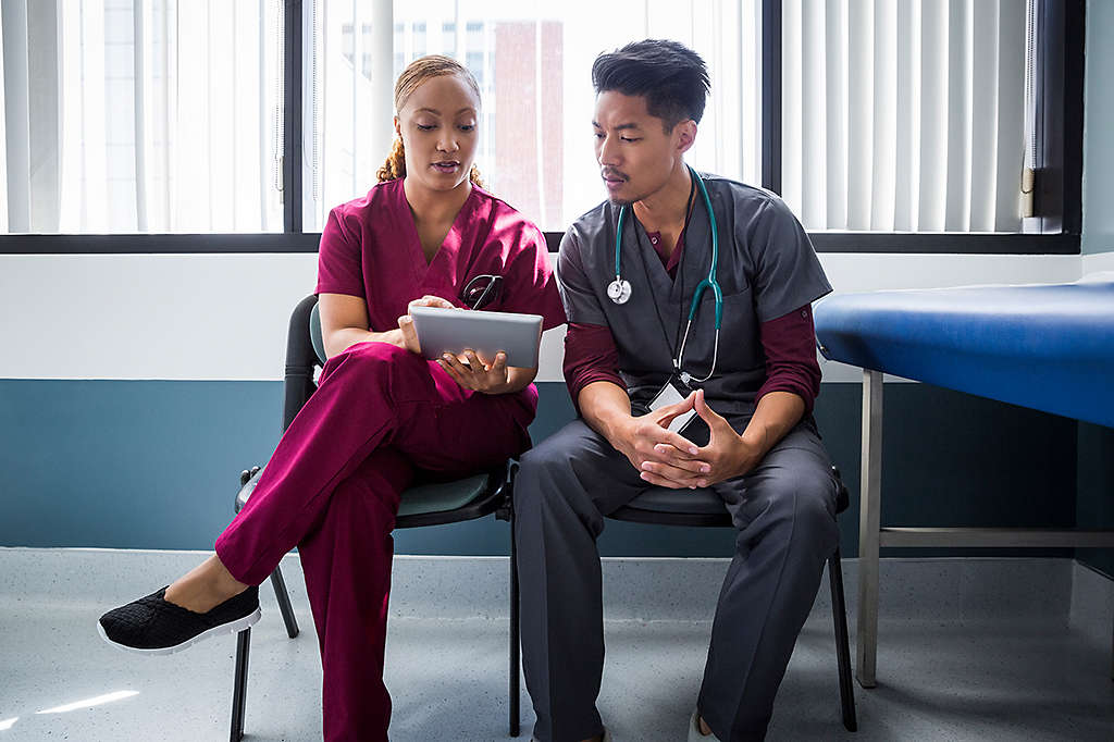 Healthcare workers on the job in a hospital.