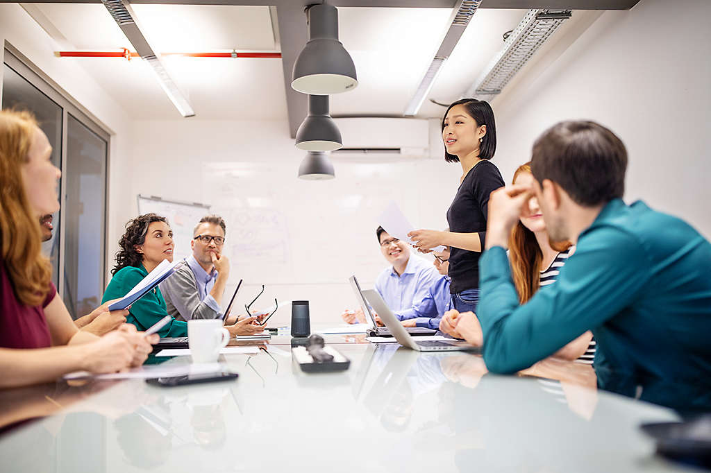 A group of HR associates having a meeting about benefits