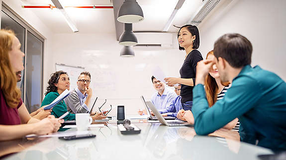 A group of HR associates having a meeting about benefits