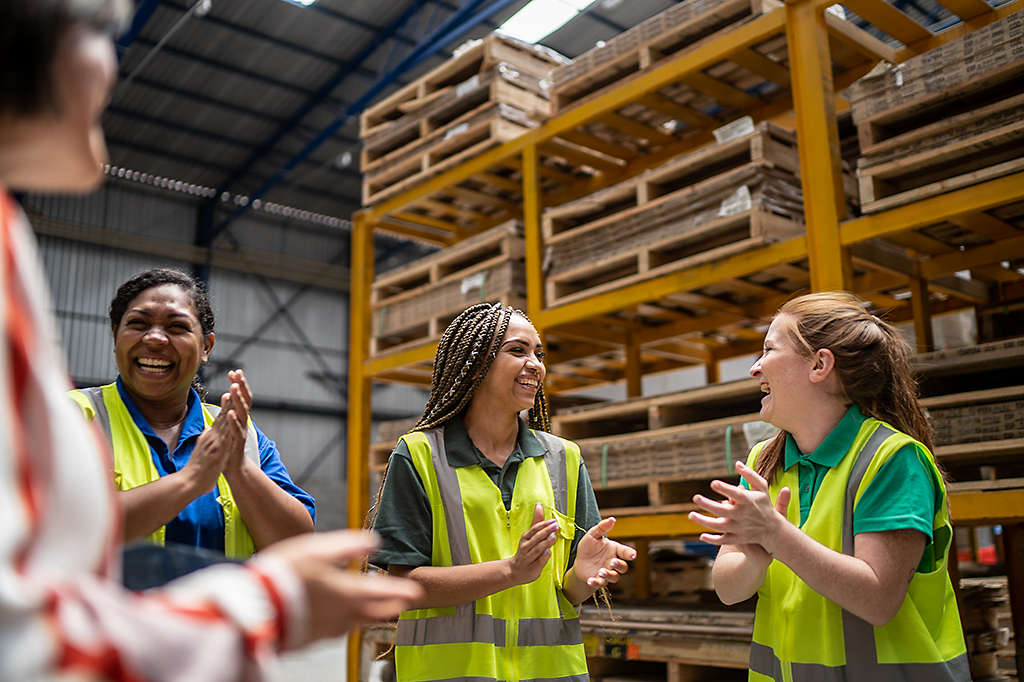 Younger workers on a factory floor 