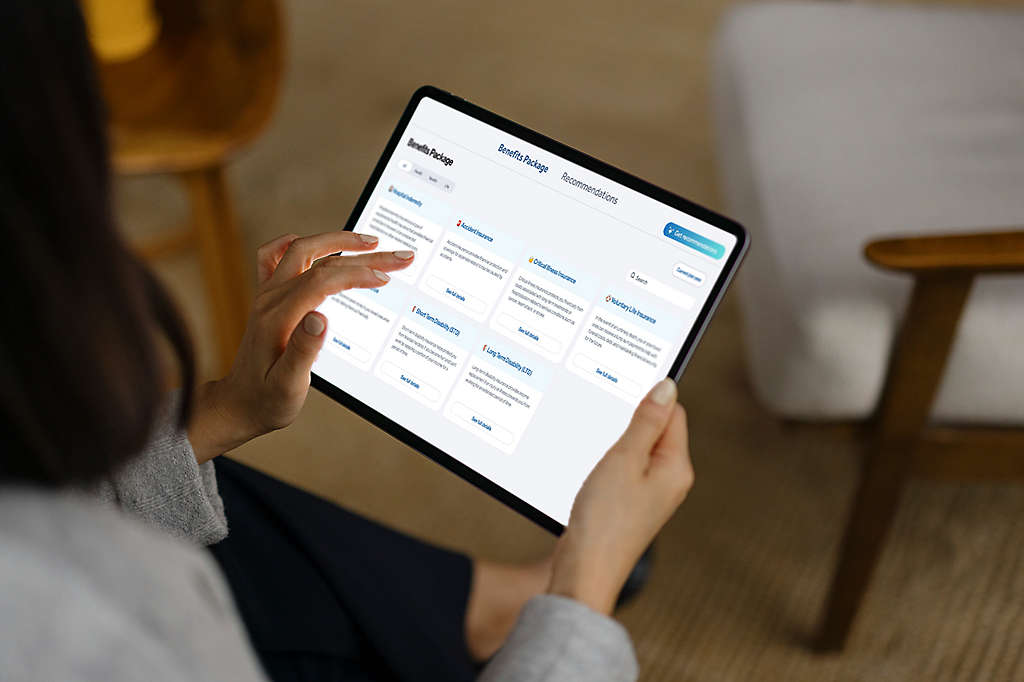 employee choosing their benefits on tablet device