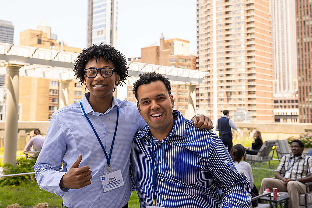 two happy interns outside during orientation meet and greet
