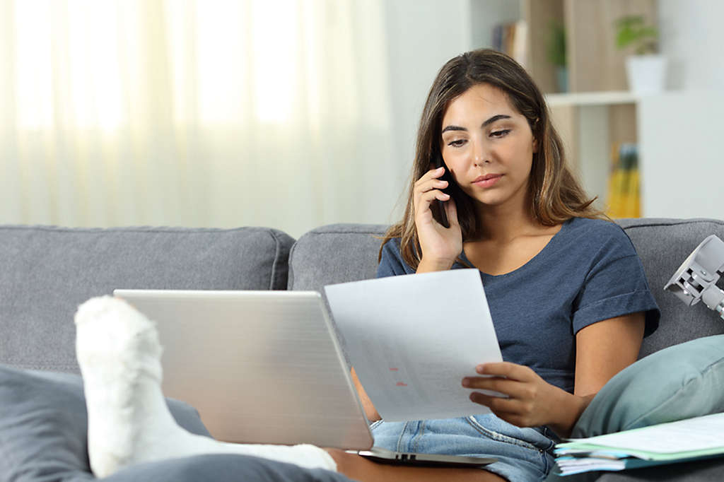 woman researching investments and mortgage costs 