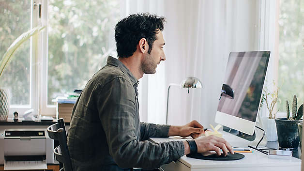 Corporate man working at computer