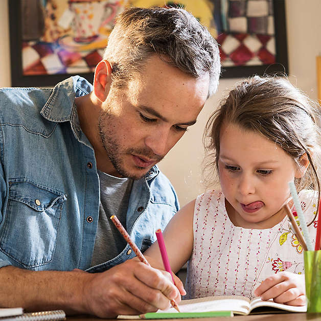 Father and daughter drawing