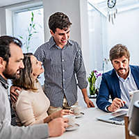 Finance advisor talking to family at home
