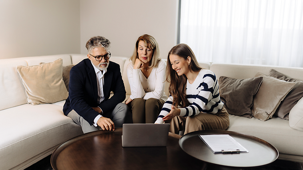 Pre-retirement couple reviewing financial plans and debt obligations.